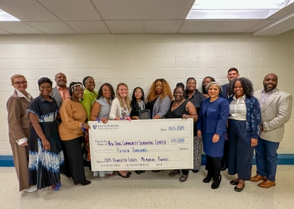 New Song and SOURCE group photo with check